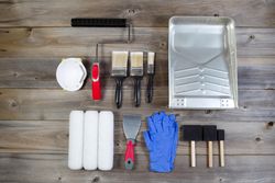 New paint supplies on weathered wood