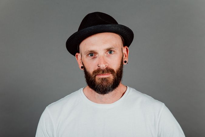 Young bald guy with hat