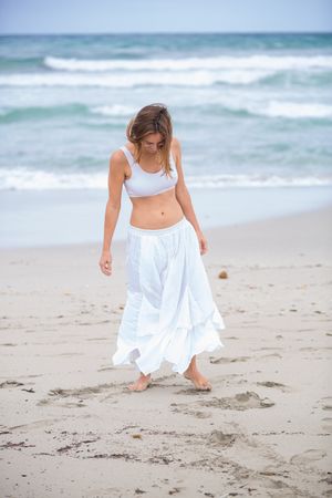 woman dancing near sea