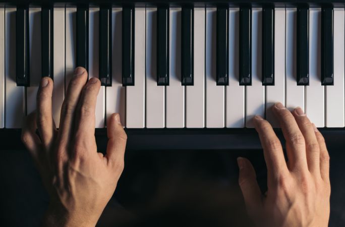 man playing piano. top view.