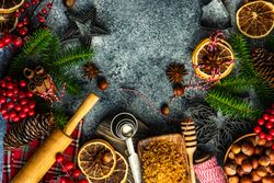 Top view of warm Christmas spices for mulled wine on counter
