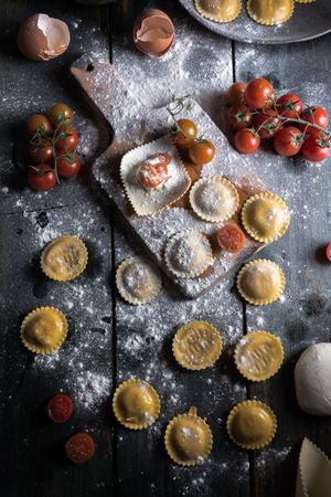 Homemade ravioli made with parmesan cheese, tomato and basil.