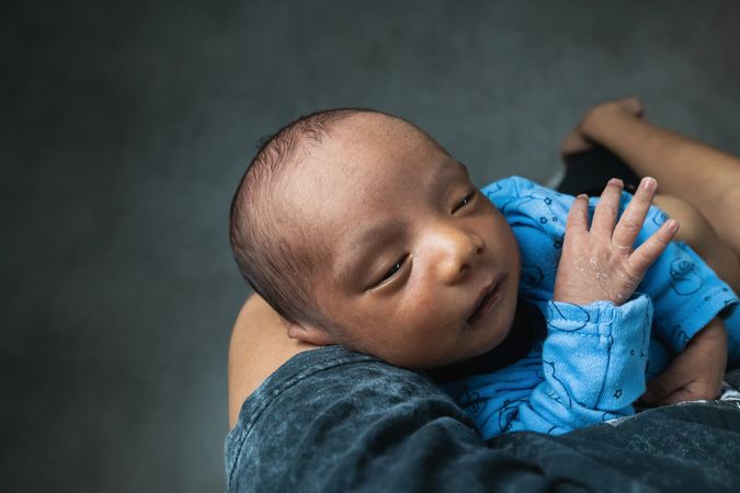 Anonymous mother holding newborn baby