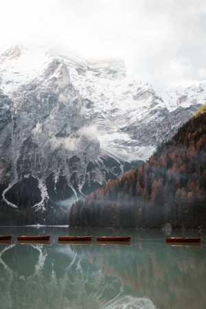 Beautiful lake with boast with mountains behind