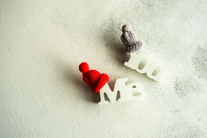 Valentine's day concept of "Me" & "You" blocks with little wintry hats