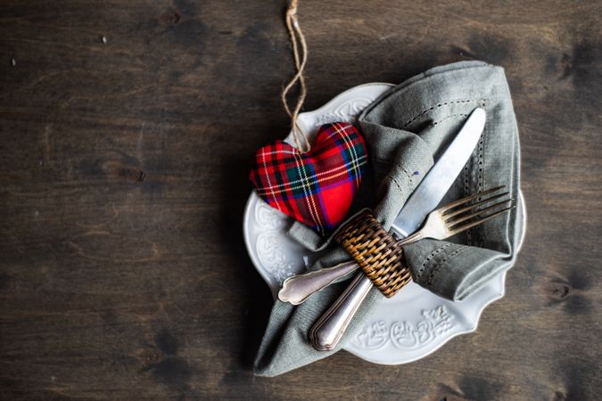 St Valentine's dinner set with tartan heart and copy space