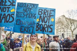 London, England, United Kingdom - March 23rd, 2019: Woman with pro-EU signs at Brexit protest 4NEJe5