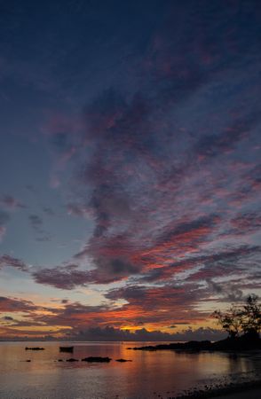 Vertical shot of beautiful sunrise in the Indian Ocean