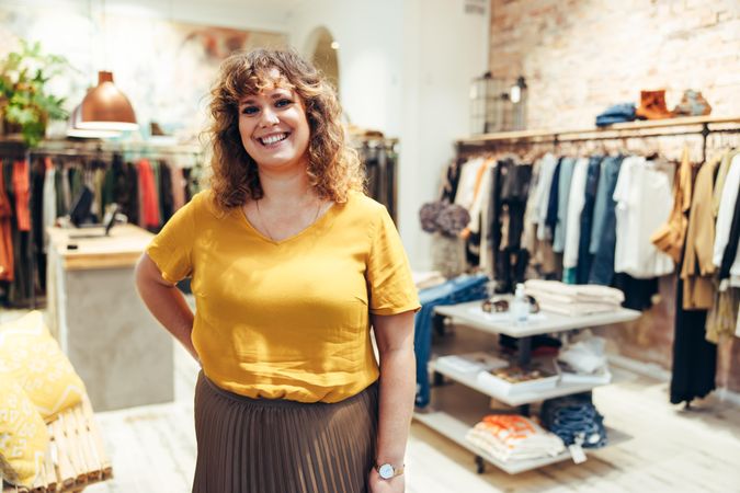 Portrait of stylish female fashion store owner