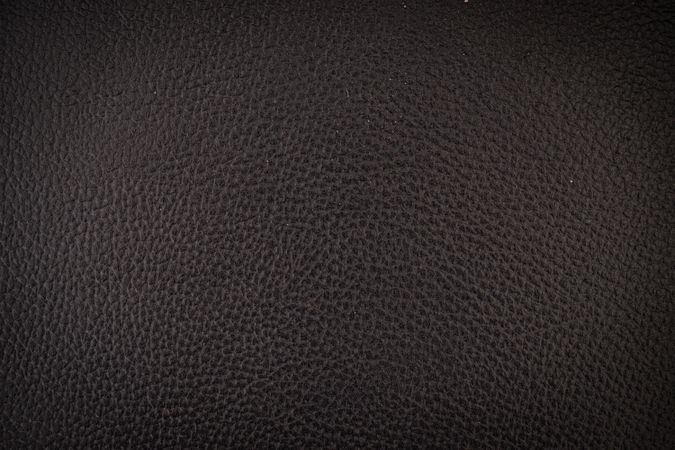 Close up dark leather background