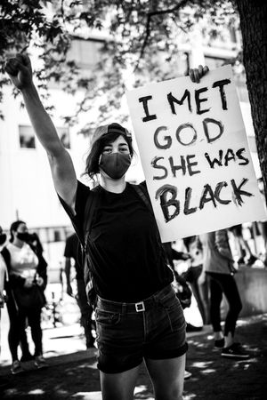MONTREAL, QUEBEC, CANADA – June 7 2020- Protester holding a sign during a black lives matter protest