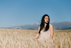 Woman standing in field