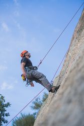 Man climbing a rock