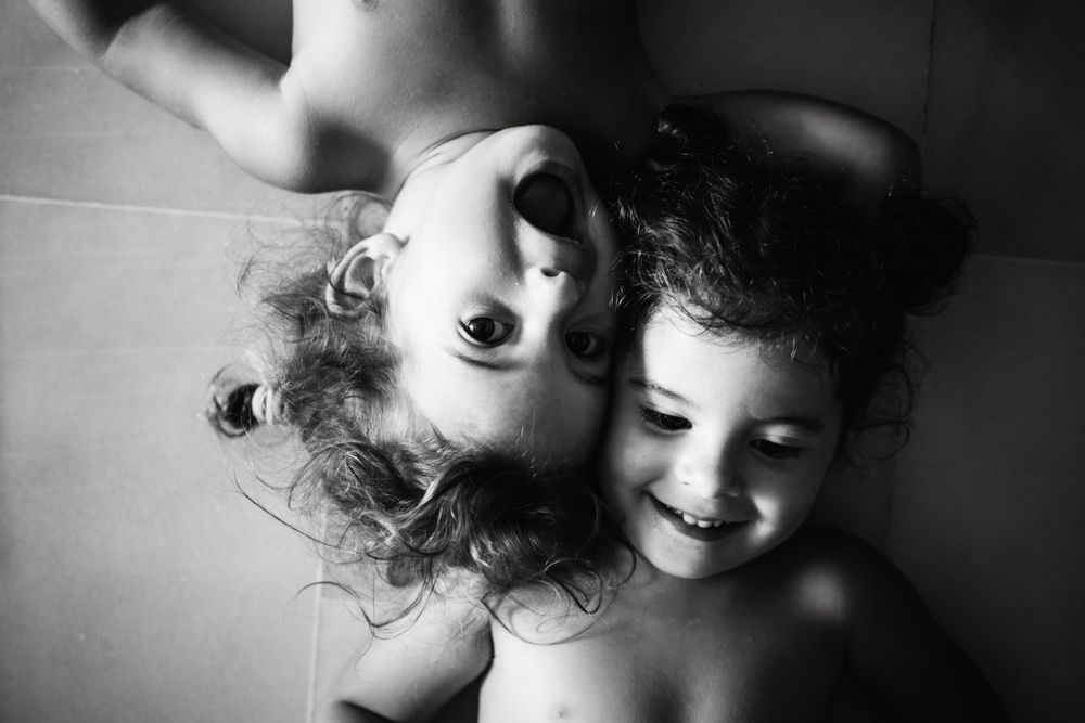 Cute little girls playing at home
