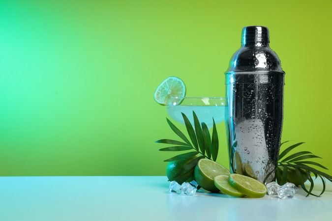 Concept of preparing cocktail, shaker, space for text