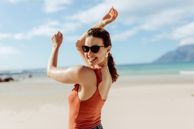 Portrait of a young woman on a vacation enjoying at the beach