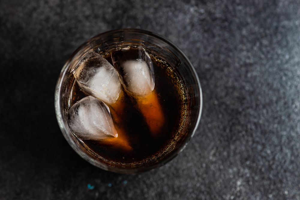 Top view of glass of cola