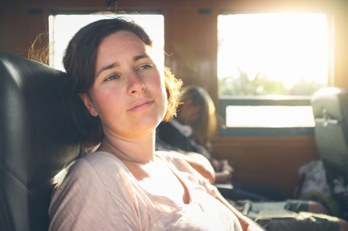 Young woman traveling in car
