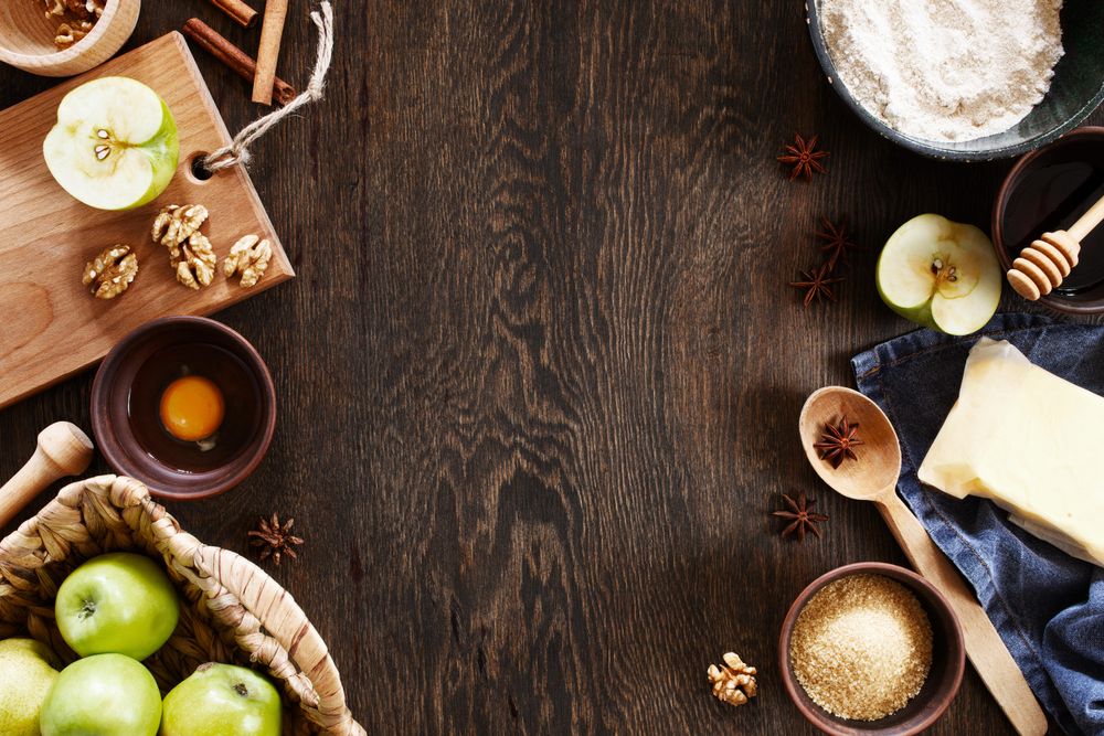 Top view of apple pie dessert ingredients with copy space