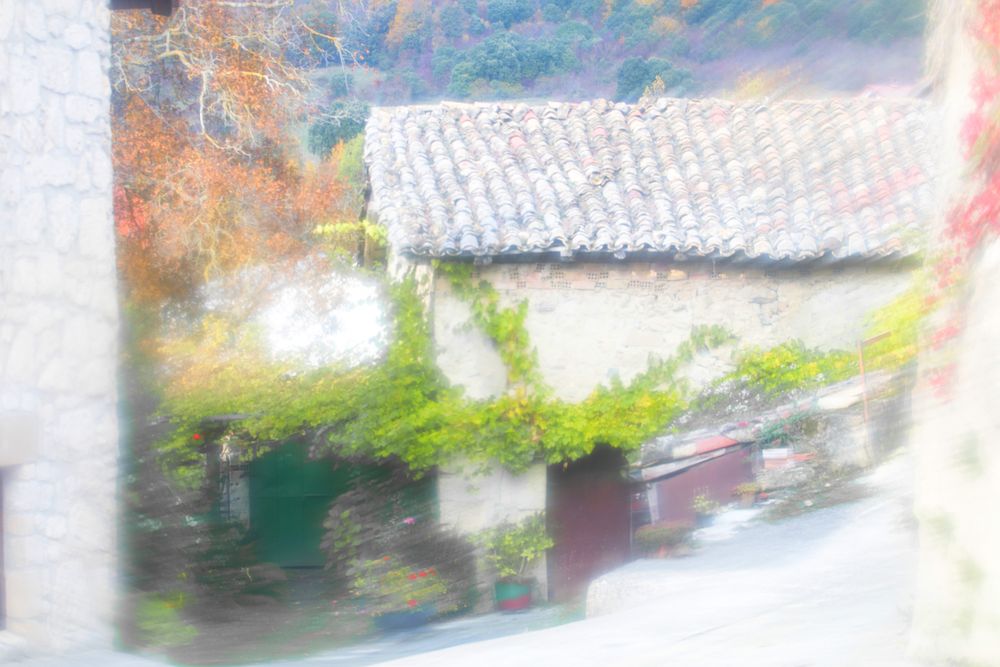 Blurred narrow street in village