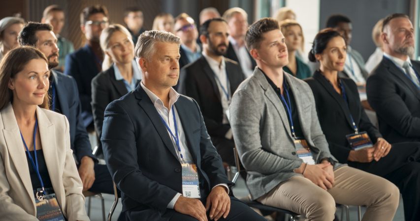 Diverse Researchers Sitting In Audience At International Science Conference.
