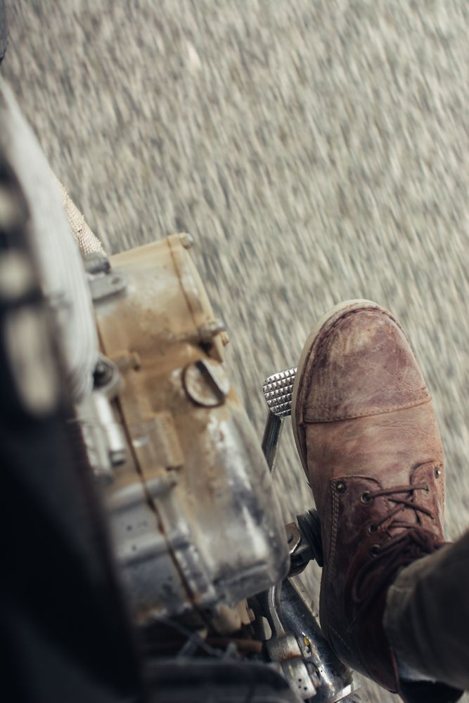 Crop leg on motorcycle pedal