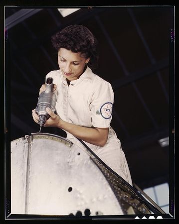 Corpus Christi, TX, USA - 1943: Oyida Peaks riveting as part of her training to become a mechanic