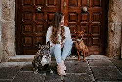 Woman with dogs on street