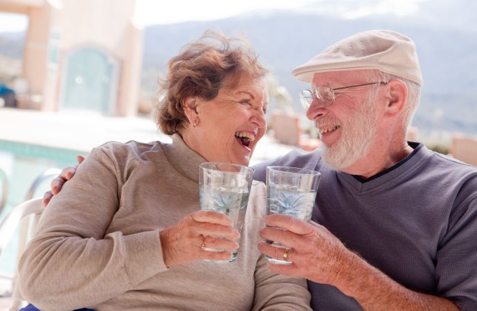 Happy Mature Adult Couple with Drinks