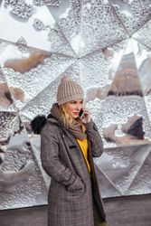 Young woman talking on the phone