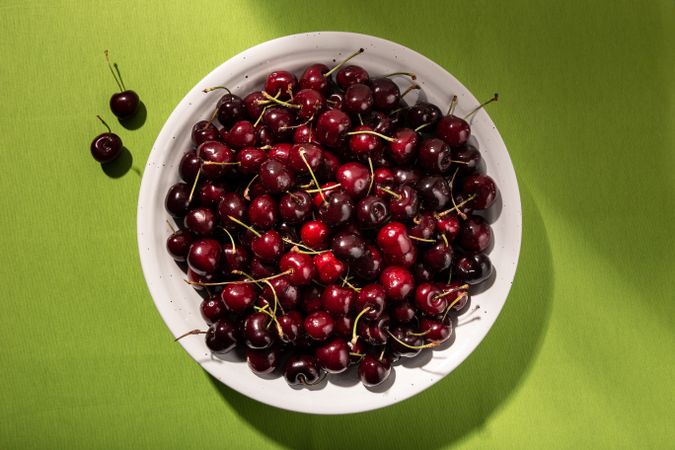 Fresh sweet cherries in bowl