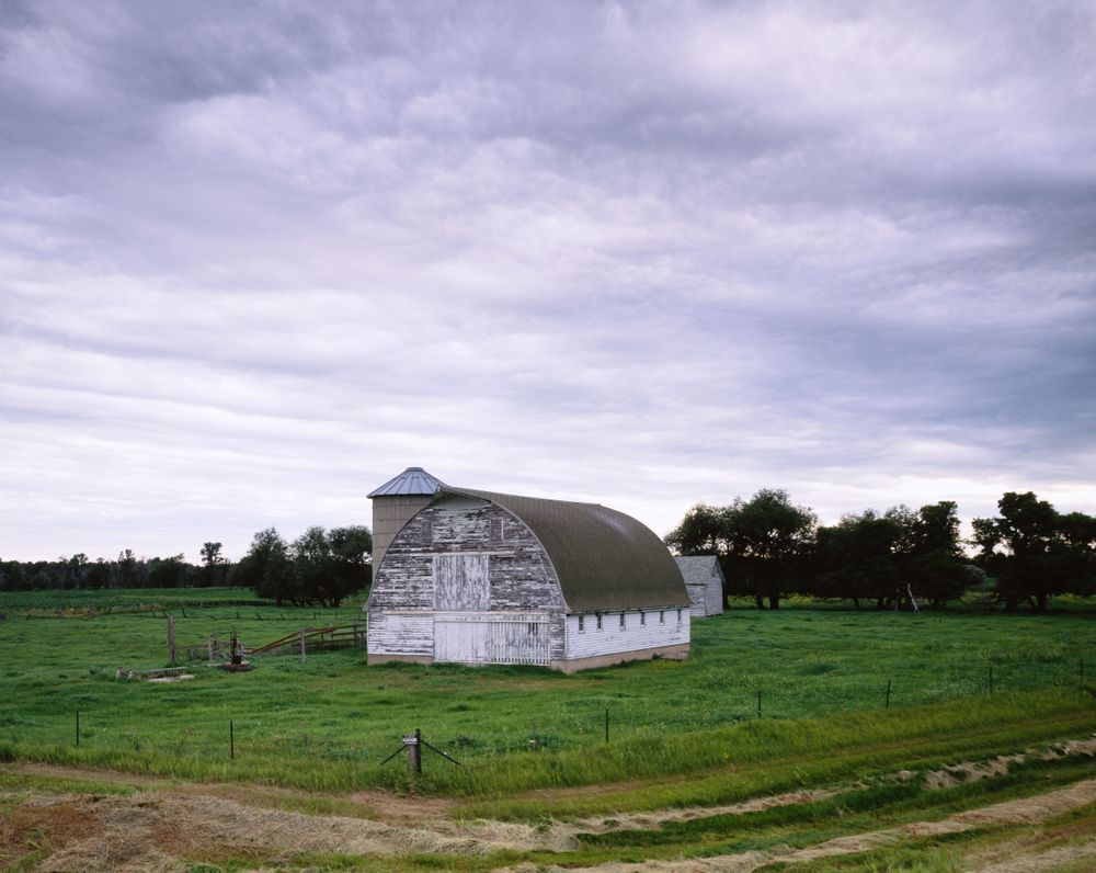 Storm clouds over barn, rural Minnesota
