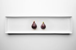 Two whole figs on appetizer plate