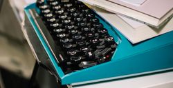 Vintage typewriter in turquoise color