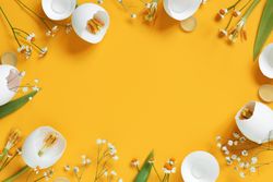 Spring flowers made of egg shells with copy space