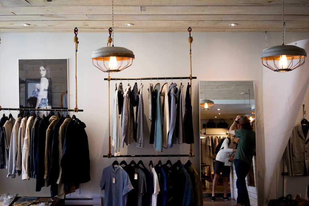 Two men shopping at fashion store