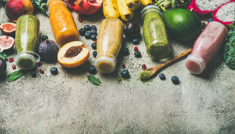 Fresh squeezed fruit and vegetable bottled juices, healthy drink concept