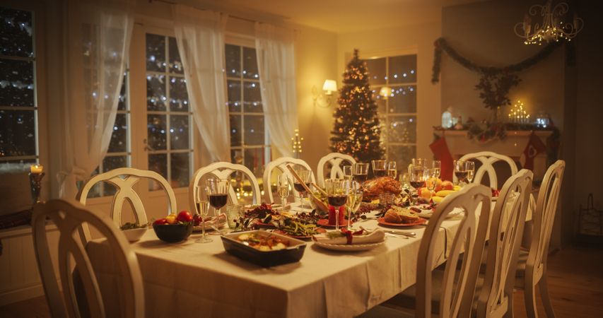 Tasty Meals and Festive Decorations Prepared for a Family Dinner at Home to Celebrate Thanksgiving Day or Christmas.