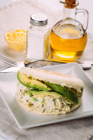 Famous Venezuelan arepa called queen pepeada, has avocado and chicken