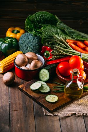 Vegetables and utensils on kitchen table