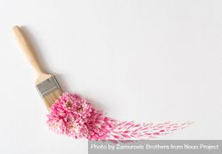 Layout made paint brush with pink flowers streak on light background 0JWrp5