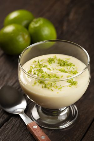 Lemon mousse with lemon zest on top.