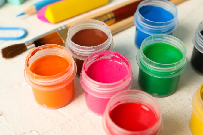Drawing supplies on wooden background, closeup