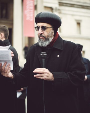 London, England, United Kingdom - March 5 2022: Man with microphone at anti-war protest