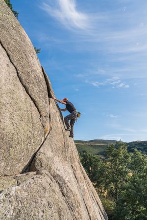 Man climbing a rock