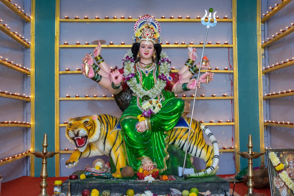 A beautiful idol of Maa Durga being worshipped at a pandal during Navratri in Mumbai, India