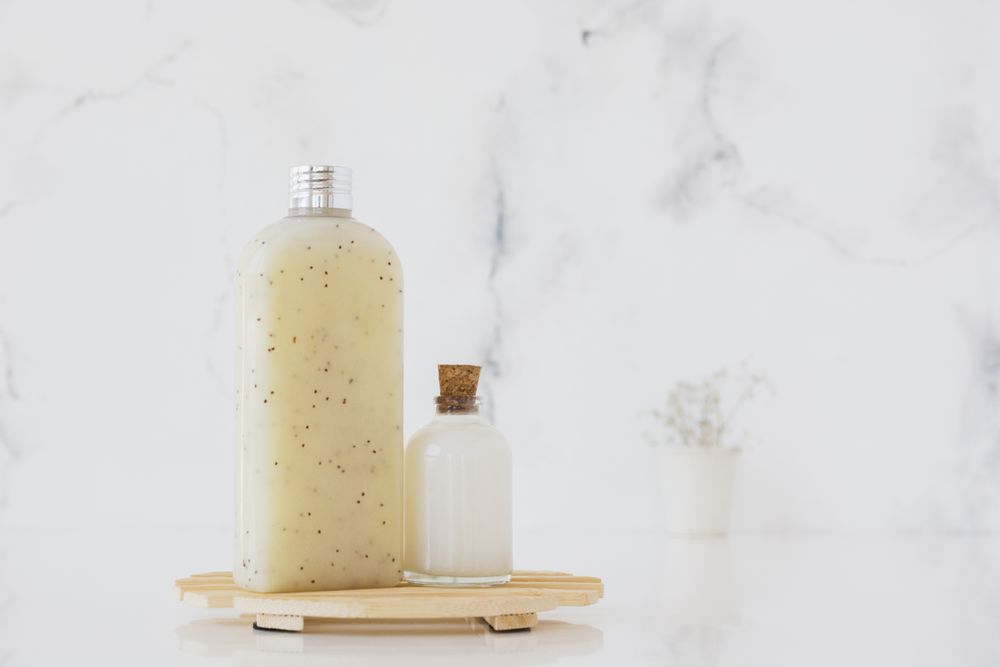 Bath products on wooden support with copy space