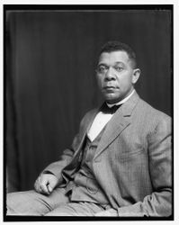 Portrait of Booker T Washington, half-length portrait, seated