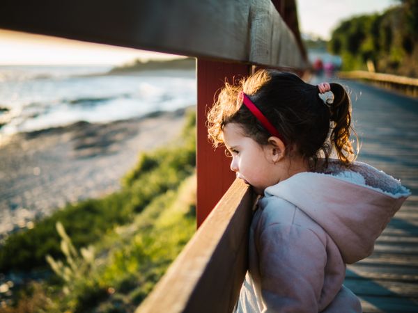 pensive girl at beach on winter