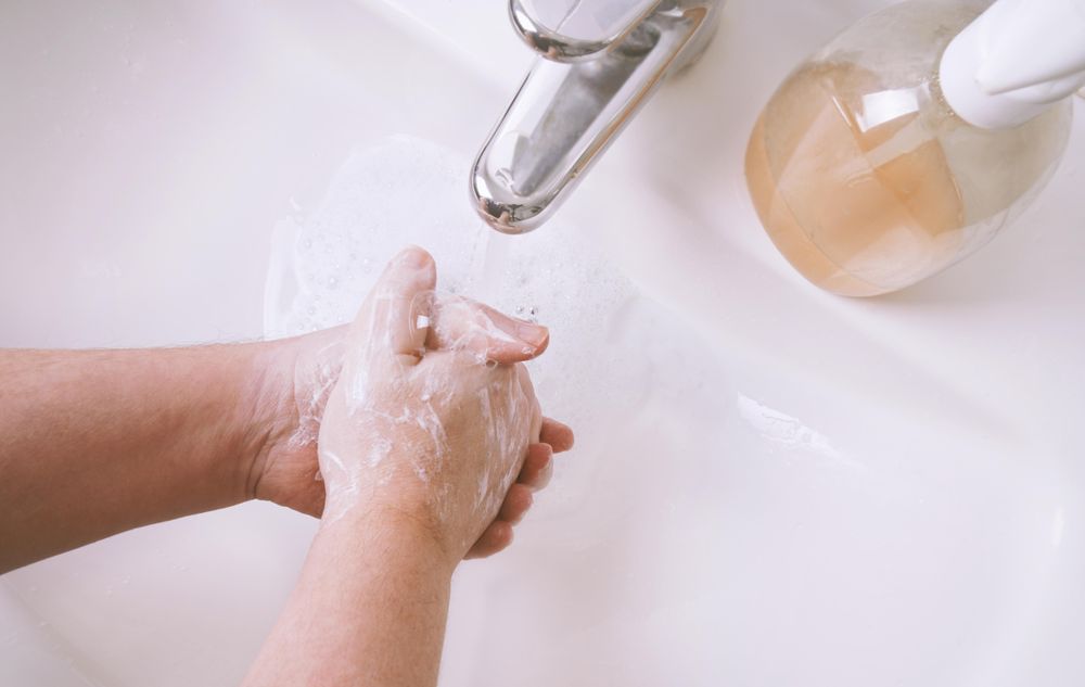 Person washing their hands